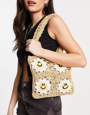 ASOS DESIGN crochet sunny happy face tote bag in natural-Brown