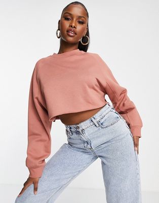 ASOS DESIGN crop sweatshirt with seam detail in rust-Brown
