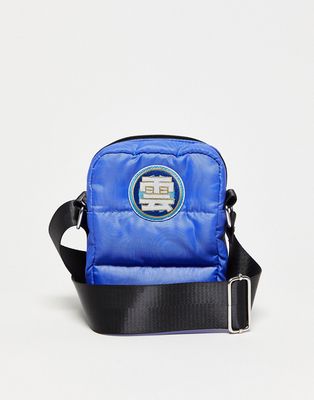 ASOS DESIGN cross body bag in blue with patch - MBLUE