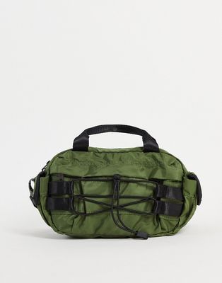ASOS DESIGN cross body bag in khaki nylon with black tech details - KHAKI-Green