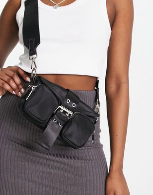 ASOS DESIGN cross body bag with buckle detailing and detachable strap in black nylon
