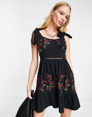 ASOS DESIGN cup detail sundress with tie shoulders in black and red floral embroidery