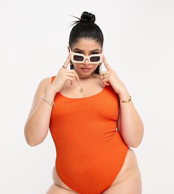 ASOS DESIGN Curve crinkle scoop low back swimsuit in deep orange