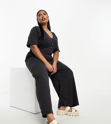 ASOS DESIGN Curve jersey button front chuck on jumpsuit in washed black