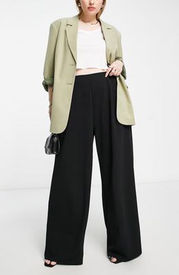 ASOS DESIGN Curve Pleated Wide Leg Jersey Trousers in Black