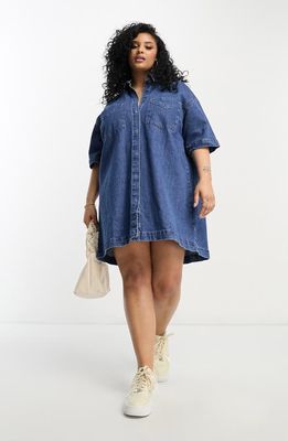 ASOS DESIGN Curve Relaxed Fit Denim Shirtdress in Medium Blue