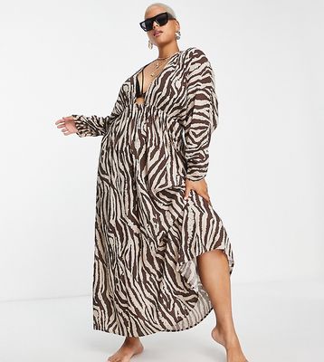 ASOS DESIGN Curve ruched long sleeve plunge beach maxi dress in animal print-Multi