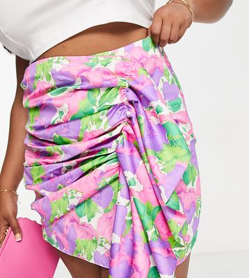 ASOS DESIGN Curve ruched satin mini skirt in bold purple floral