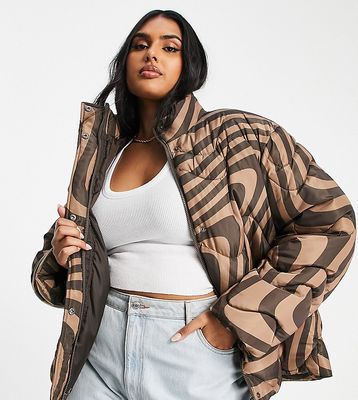 ASOS DESIGN Curve swirl quilted puffer jacket in brown