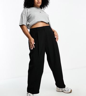 ASOS DESIGN Curve tapered pants with turn up hem in black