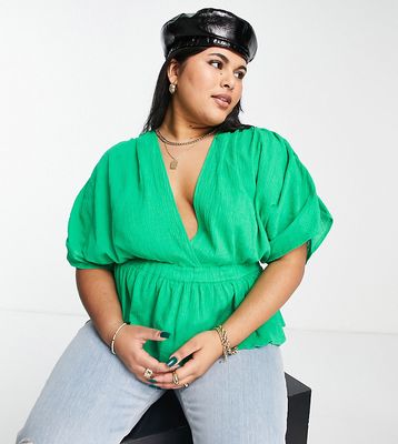 ASOS DESIGN Curve textured plunge front top with elastic waist detail in bright green