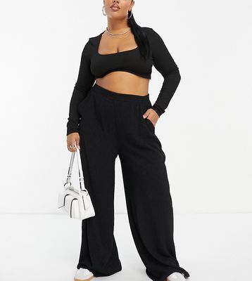 ASOS DESIGN Curve textured pull-on wide leg pants in black