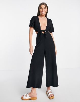 ASOS DESIGN deep v jumpsuit with puff sleeve in black