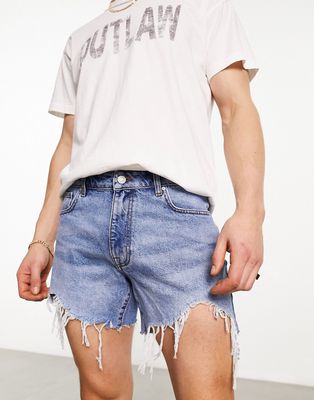 ASOS DESIGN denim shorts in lightwash with rip detail and raw hem in shorter length-Blue