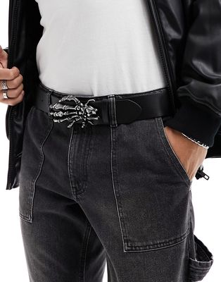 ASOS DESIGN faux leather belt with gunmetal skull hand in black