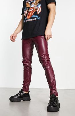 ASOS DESIGN Faux Leather Skinny Jeans in Burgundy