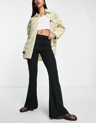 ASOS DESIGN flare pants in crepe with side vent in black