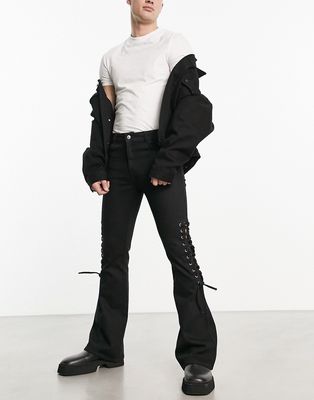 ASOS DESIGN flared jeans with lace-up design in black