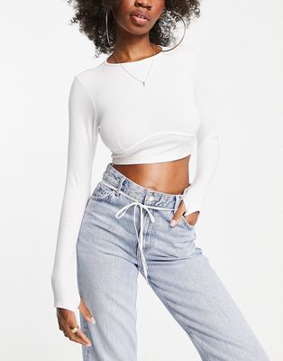 ASOS DESIGN Fuller Bust super crop top with thumbhole and bust seam detail in white