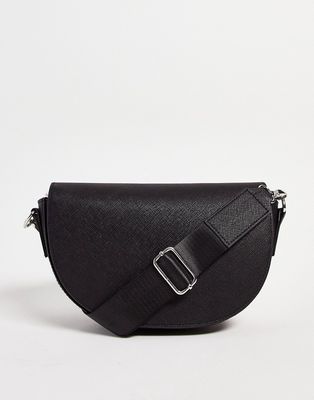 ASOS DESIGN half moon cross body bag in black faux leather
