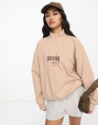 ASOS DESIGN half zip arizona graphic sweatshirt in taupe-Neutral