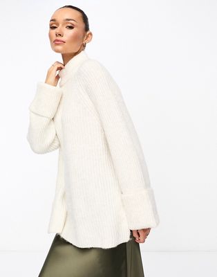 ASOS DESIGN high neck sweater with turn back cuff in long and lean block in cream-White