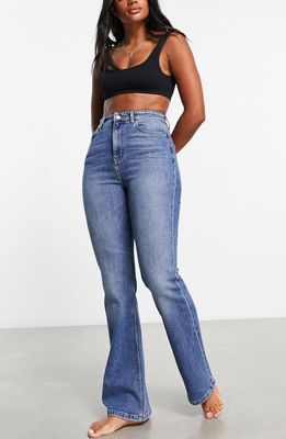 ASOS DESIGN High Waist Flare Jeans in Medium Blue