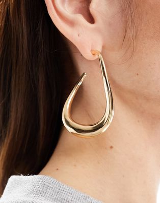 ASOS DESIGN hoop earrings with abstract twist design in gold tone