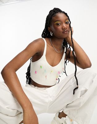 ASOS DESIGN knitted bralette with charm detail in cream-White