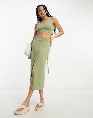 ASOS DESIGN knitted midi skirt with wrap detail in textured yarn in khaki - part of a set-Green