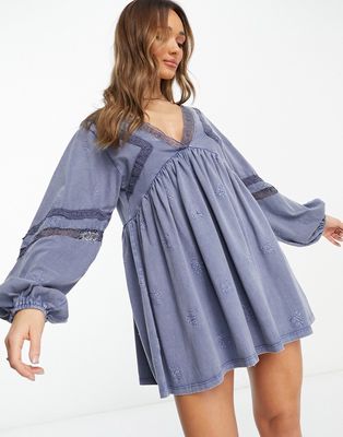 ASOS DESIGN lace insert v neck smock dress with long sleeve with embroidery detail in washed blue