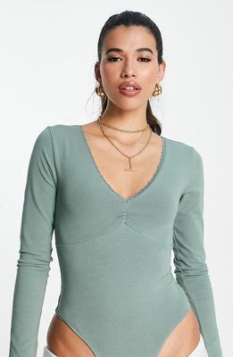 ASOS DESIGN Lace Trim Long Sleeve Bodysuit in Light Green