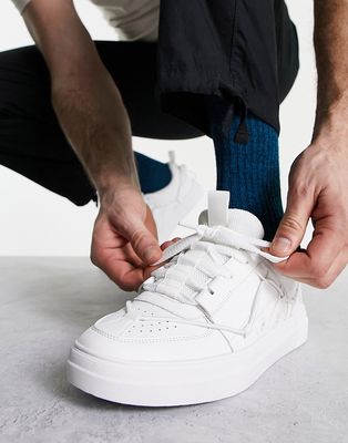 ASOS DESIGN lace up paneled sneakers in white