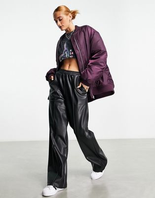 ASOS DESIGN leather look pull on pants in black