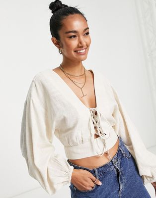 ASOS DESIGN linen top with lace up front & volume sleeve in oatmeal-Neutral
