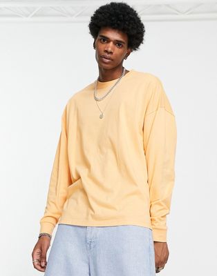 ASOS DESIGN long sleeve oversized T-shirt in apricot-Orange