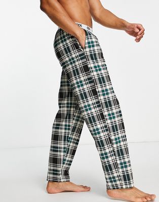 ASOS DESIGN lounge pajama bottoms with check print in black and green-Multi