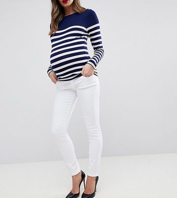 ASOS DESIGN Maternity high rise ridley 'skinny' jeans in white with under the bump waistband