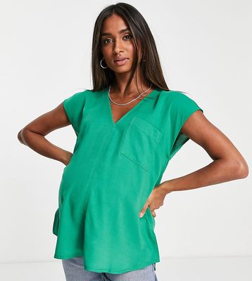 ASOS DESIGN Maternity pocket tee with longline back in green