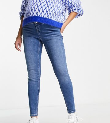 ASOS DESIGN Maternity ultimate skinny jeans in authentic mid blue with over the bump waistband