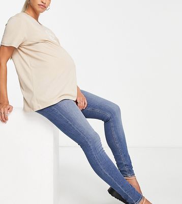 ASOS DESIGN Maternity ultimate skinny jeans in authentic mid blue with under the bump waistband-Blues