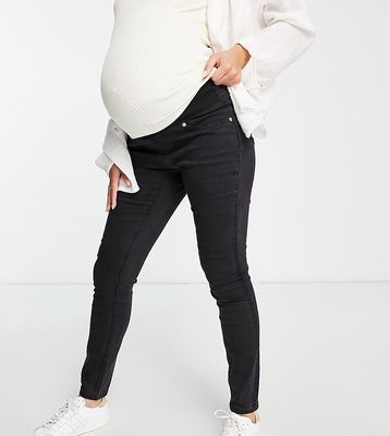 ASOS DESIGN Maternity ultimate skinny jeans in washed black with under the bump waistband