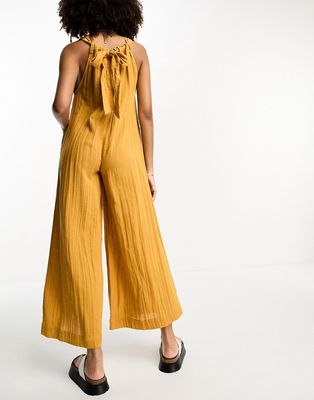 ASOS DESIGN minimal crinkle overalls jumpsuit in mustard-Yellow