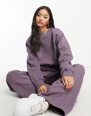 ASOS DESIGN minimal oversized sweatshirt with shoulder pads in aubergine-Purple