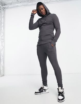 ASOS DESIGN muscle hoodie with super skinny sweatpants tracksuit in washed black