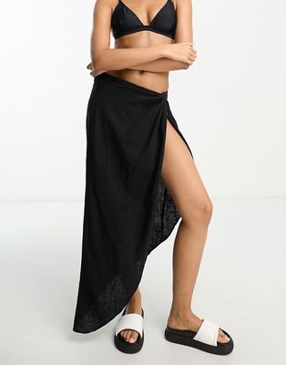 ASOS DESIGN natural asymmetric beach skirt with twist front in black