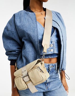 ASOS DESIGN nylon cross body bag with buckle detailing and detachable strap in stone-Neutral