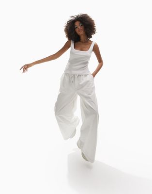 ASOS DESIGN open hem parachute cargo pants in white