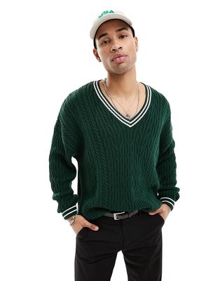 ASOS DESIGN oversized cable knit cricket sweater in green & white tipping