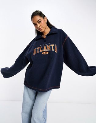 ASOS DESIGN oversized half zip borg fleece with Atlanta embroidery-Navy